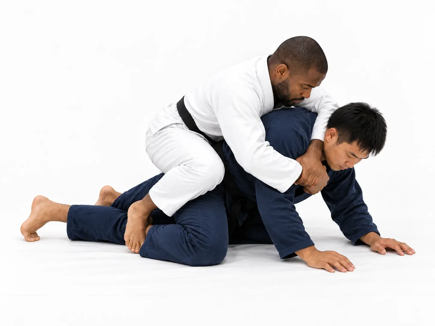 The top player following the turn with his hips and riding the opponent onto all fours.
