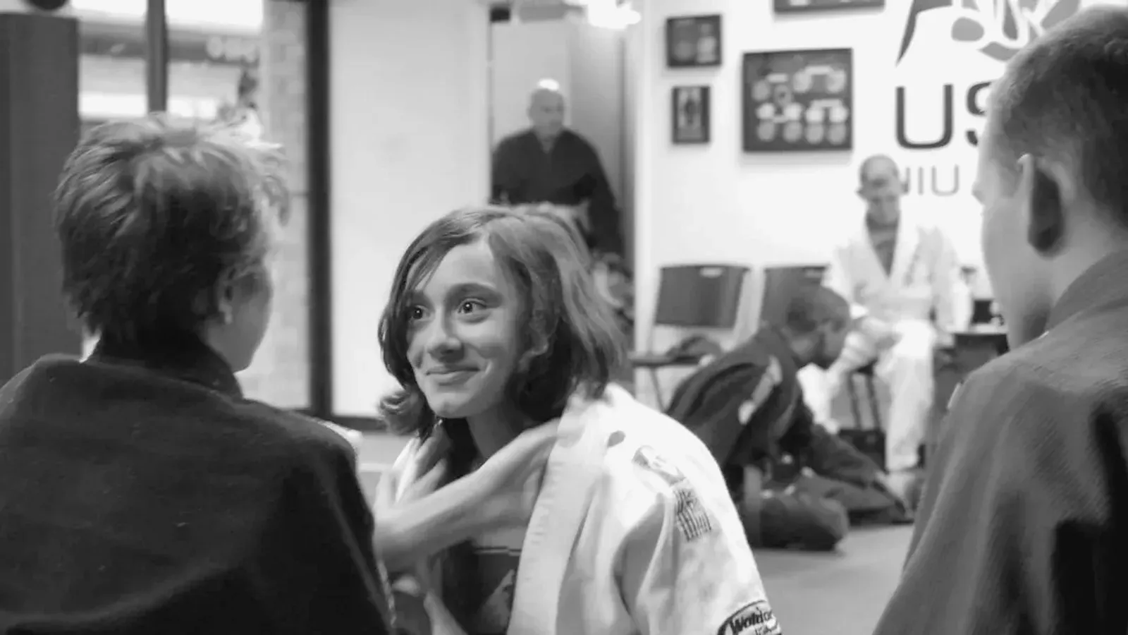 Brazilian Jiu Jitsu practitioners during a academy atmosphere.