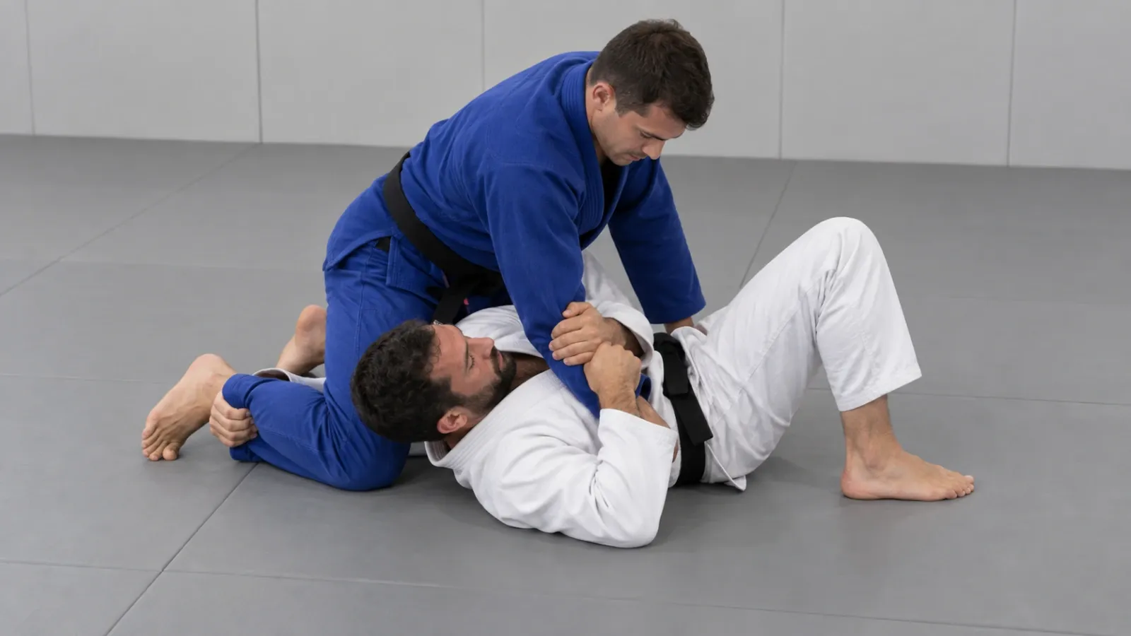 A player mounted from below, trapping the opponent’s arm across their chest before bridging.