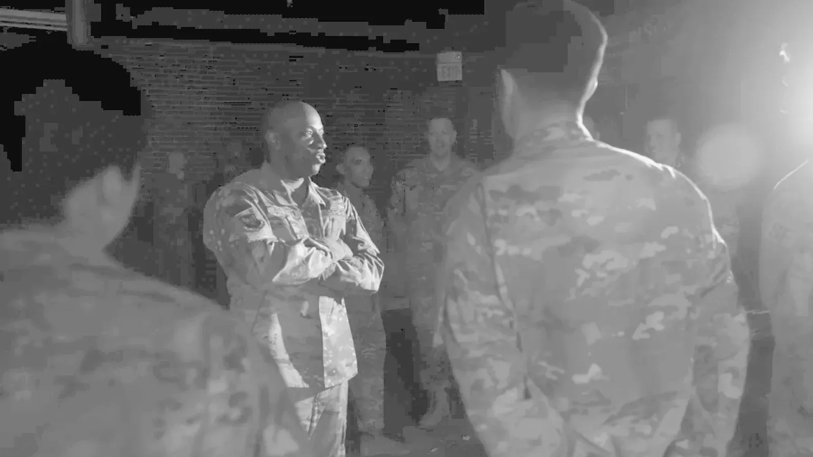 Brazilian Jiu Jitsu practitioners chief wright visits interacts airmen while training on the mat.
