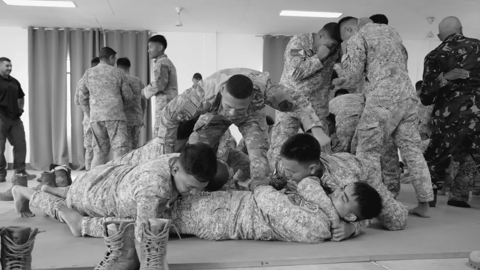 Brazilian Jiu Jitsu practitioners combatives training enhances interoperability at cope while training on the mat.