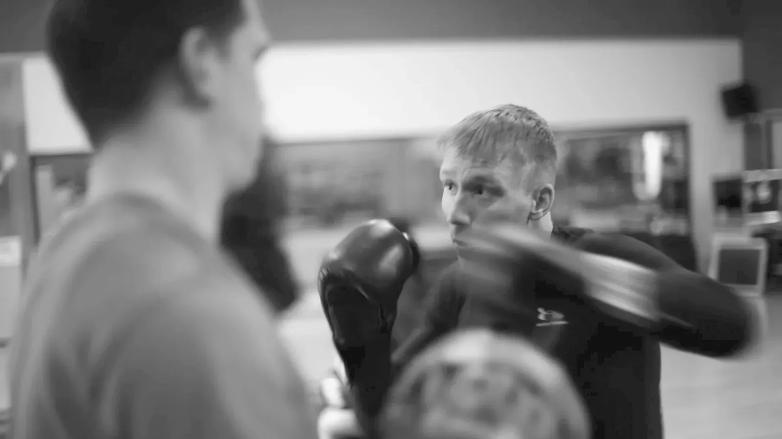 Brazilian Jiu Jitsu practitioners fighter shakes off defeat 140311 f while training on the mat.