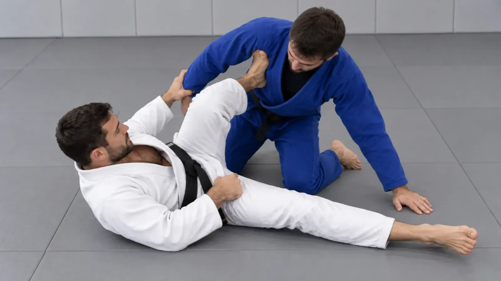 The legs swinging in opposite directions, the momentum turning the opponent over.