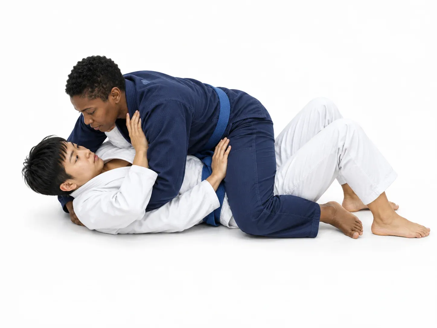 A pinned player on the bottom with both forearms framing against the opponent’s shoulder and hip.