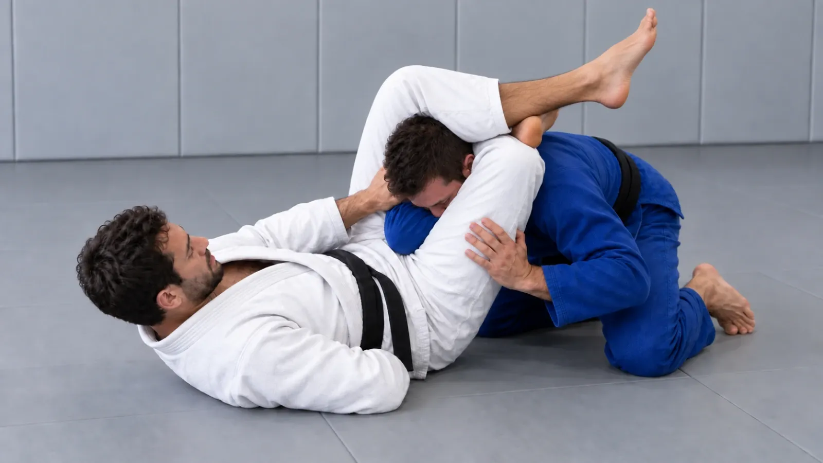The finished triangle: the figure four locked behind the knee and the opponent’s head pulled down.